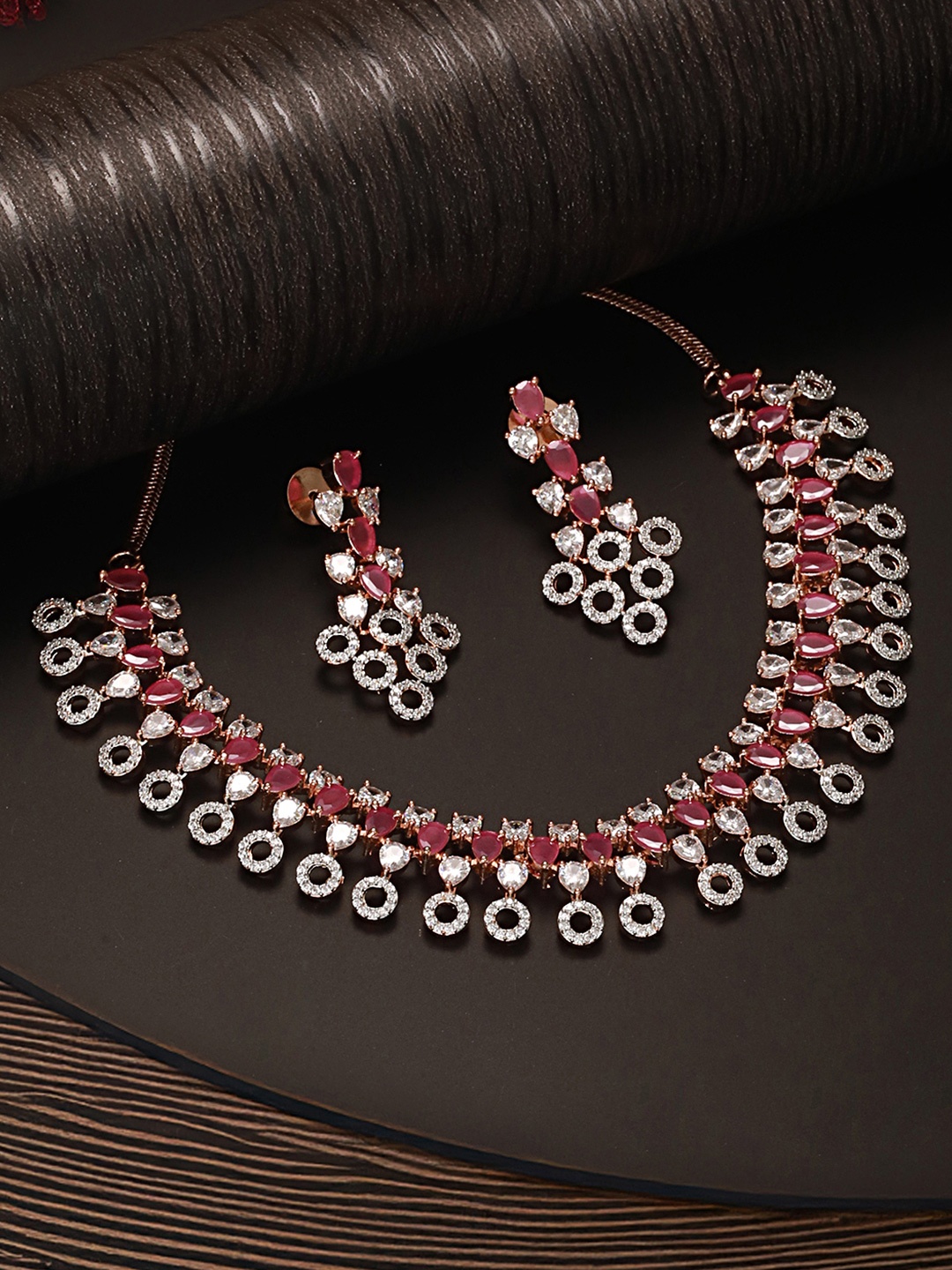 

Saraf RS Jewellery Rose Gold-Plated Red AD-Studded Jewellery Set