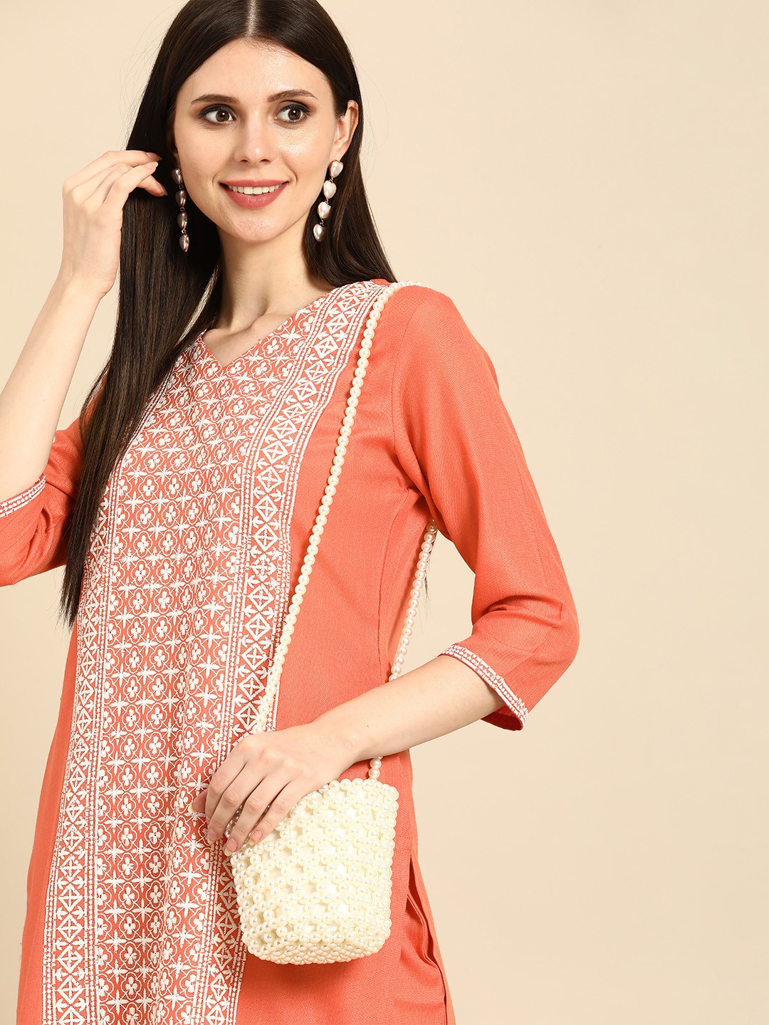 

Anouk Women Orange & White Ethnic Motifs Embroidered Kurta with Palazzos