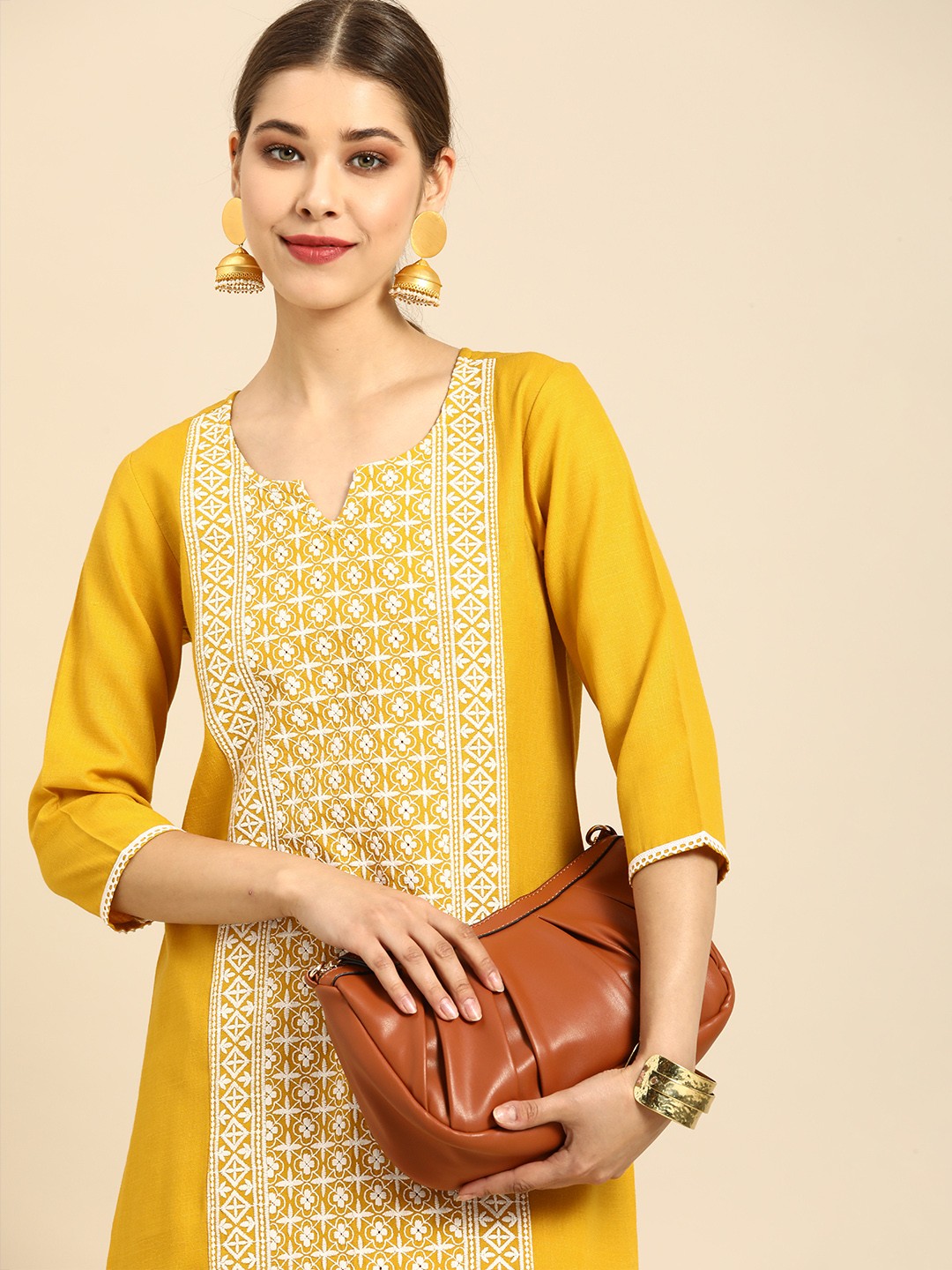 

Anouk Women Mustard Yellow & White Ethnic Motifs Embroidered Kurta with Palazzos