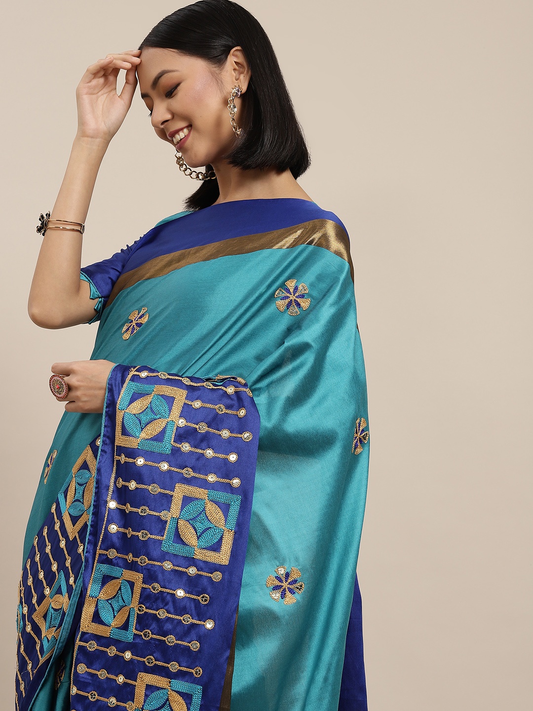 

Mitera Blue & Copper Geometric Embroidered Sequinned Saree