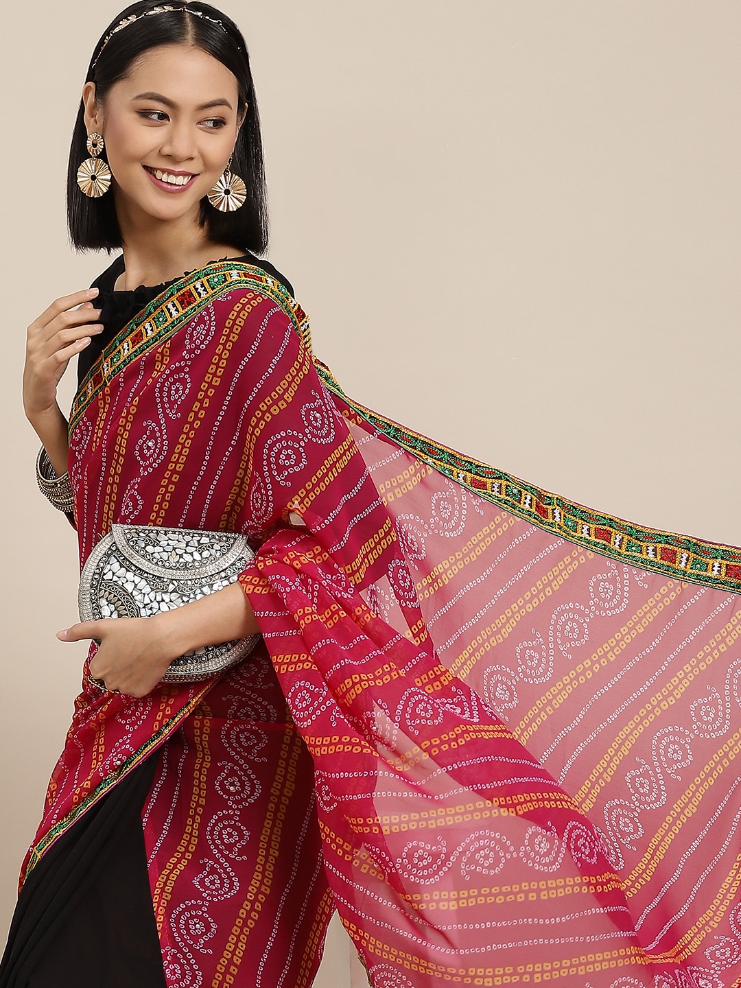 

Mitera Pink & Black Ethnic Motifs Kutchi Embroidery Pure Georgette Saree