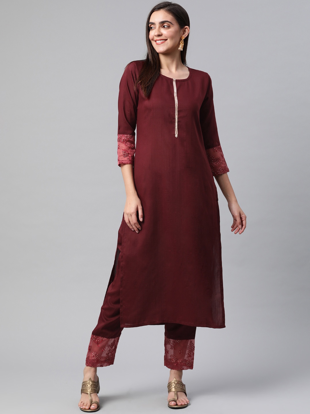 

Somras Women Maroon Ethnic Motifs Embroidered Kurta with Trousers