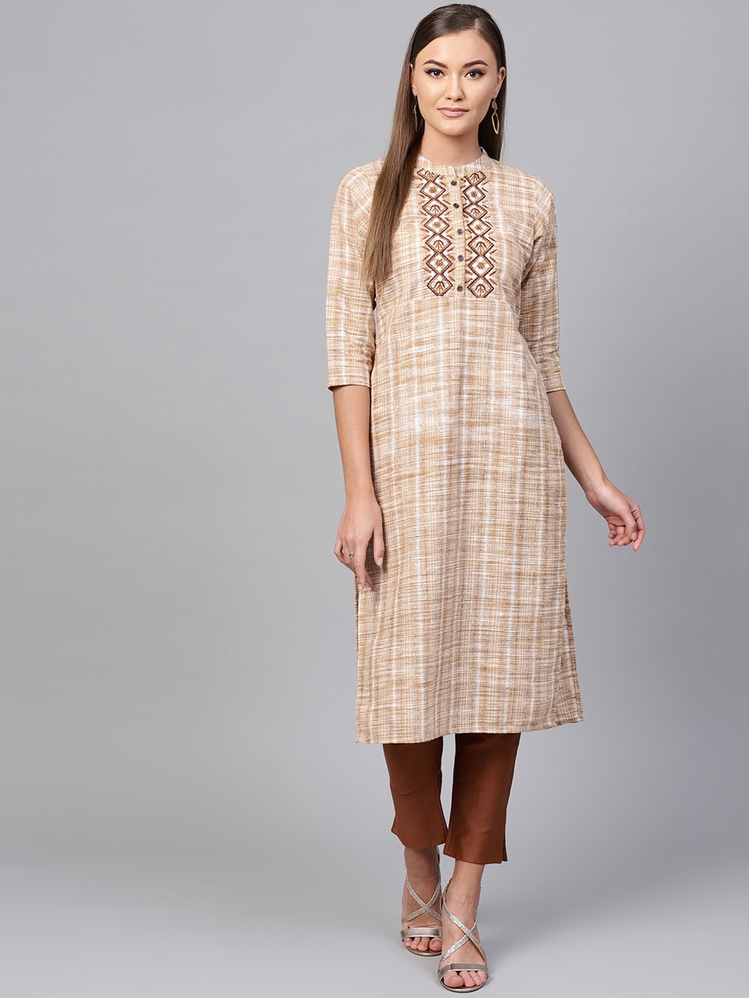 

Indo Era Women Beige Yoke Design Embroidered Straight Cotton Kurta