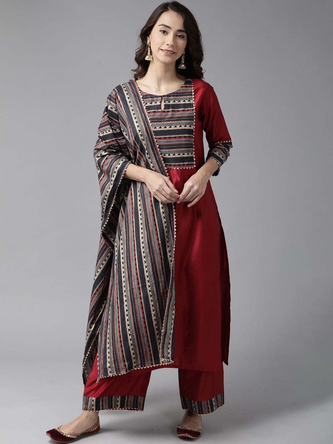 

Indo Era Women Maroon Striped Empire Liva Kurta with Palazzos & With Dupatta