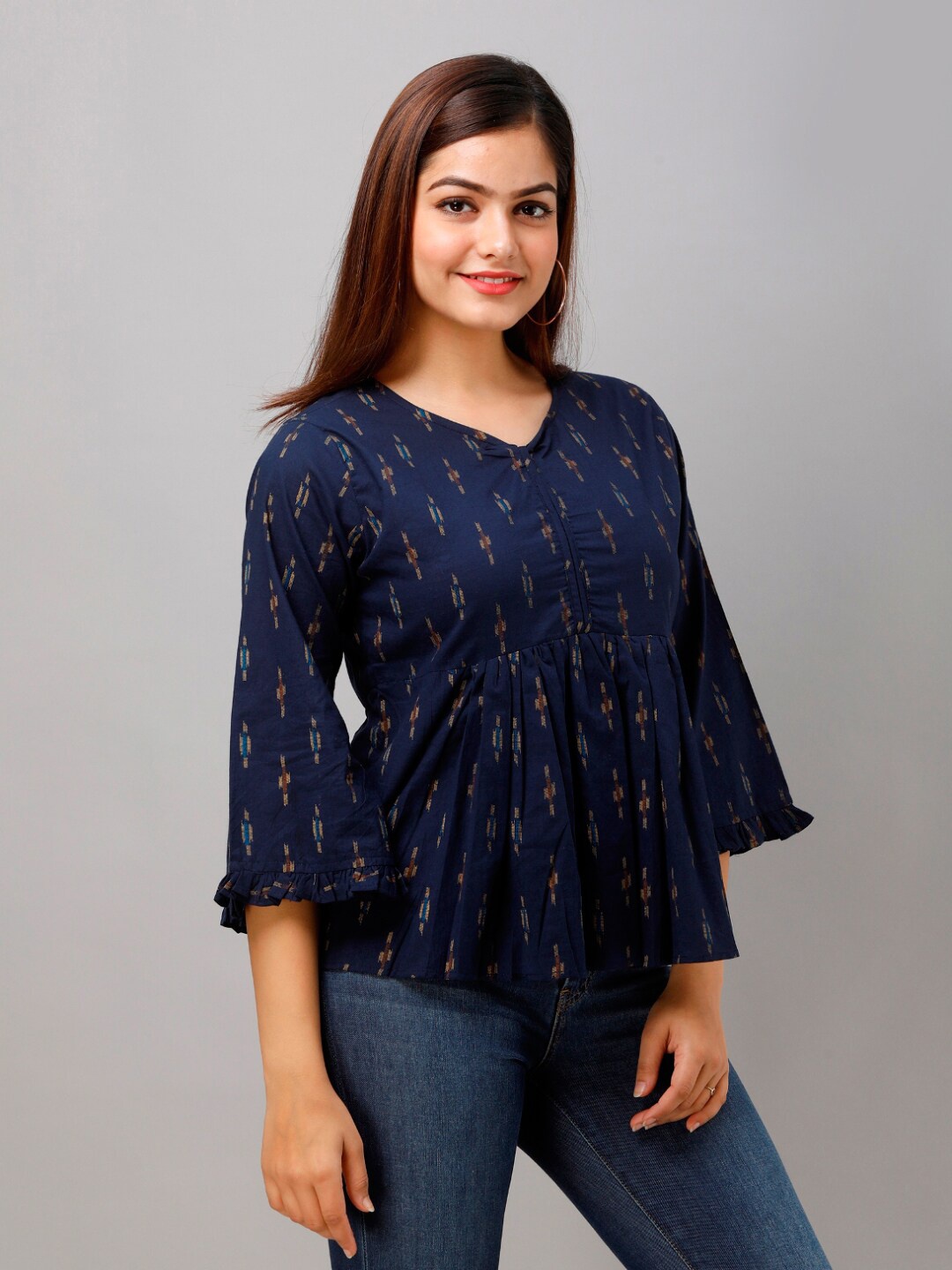 

KALINI Blue Floral Ikat Print Empire Top