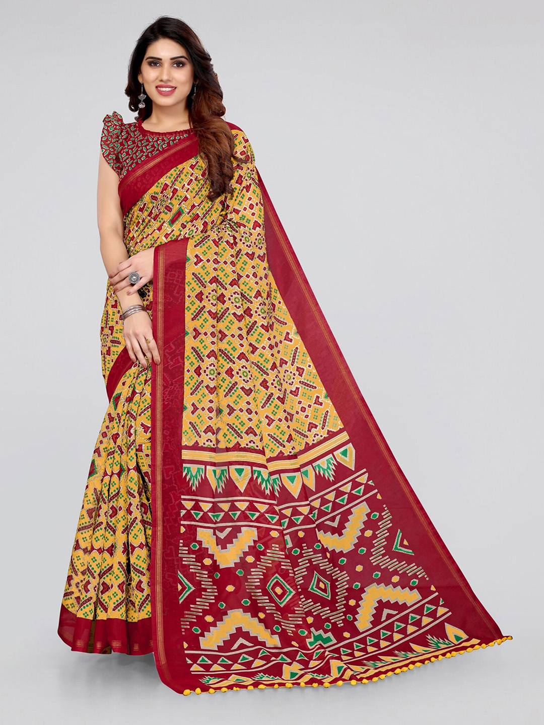 

MIRCHI FASHION Mustard & Red Ethnic Motifs Ikat Saree