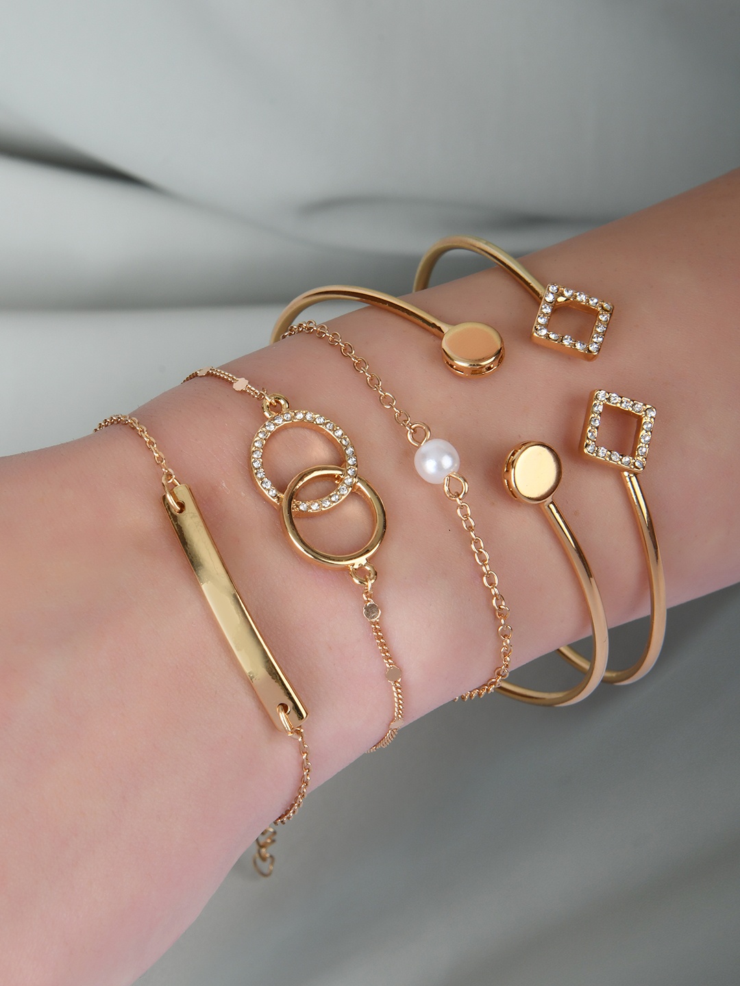 

Lilly & sparkle Women Set of 5 Gold-Plated Crystal Studded Bracelets