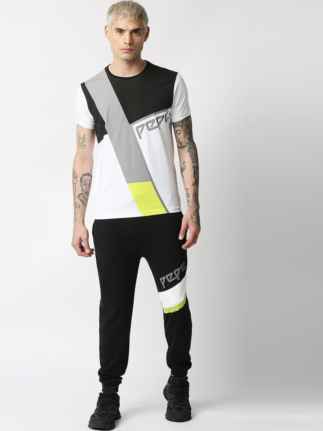 

Pepe Jeans Men Green & Black Solid Slim-Fit Joggers