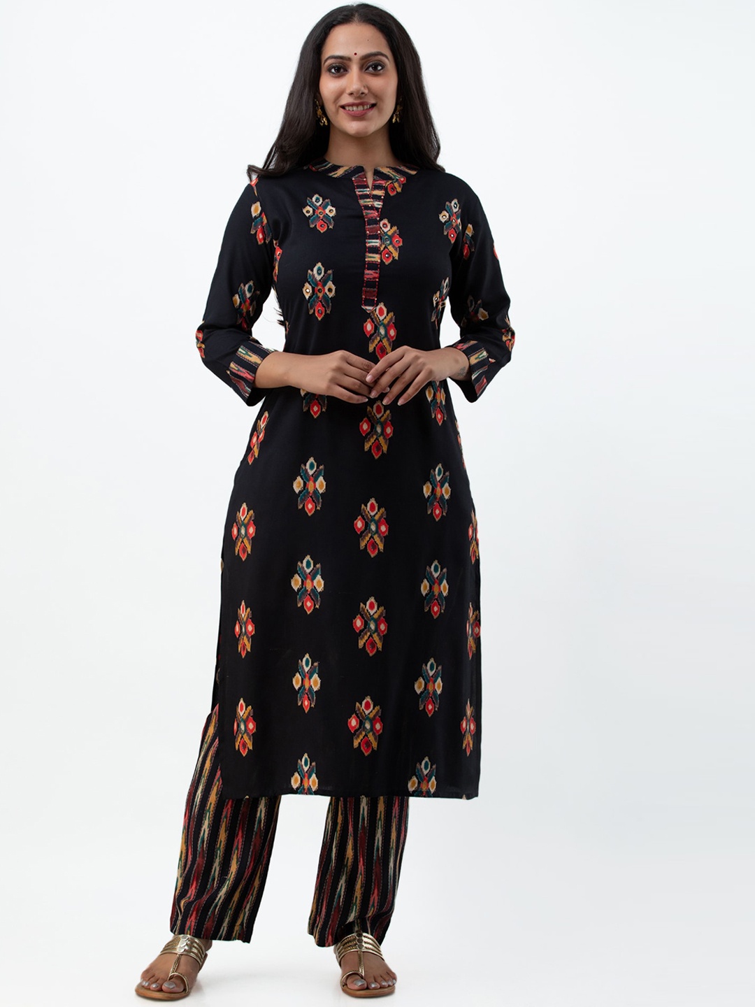 

MYAZA Women Black Floral Embroidered Empire Thread Work Kurti with Trousers
