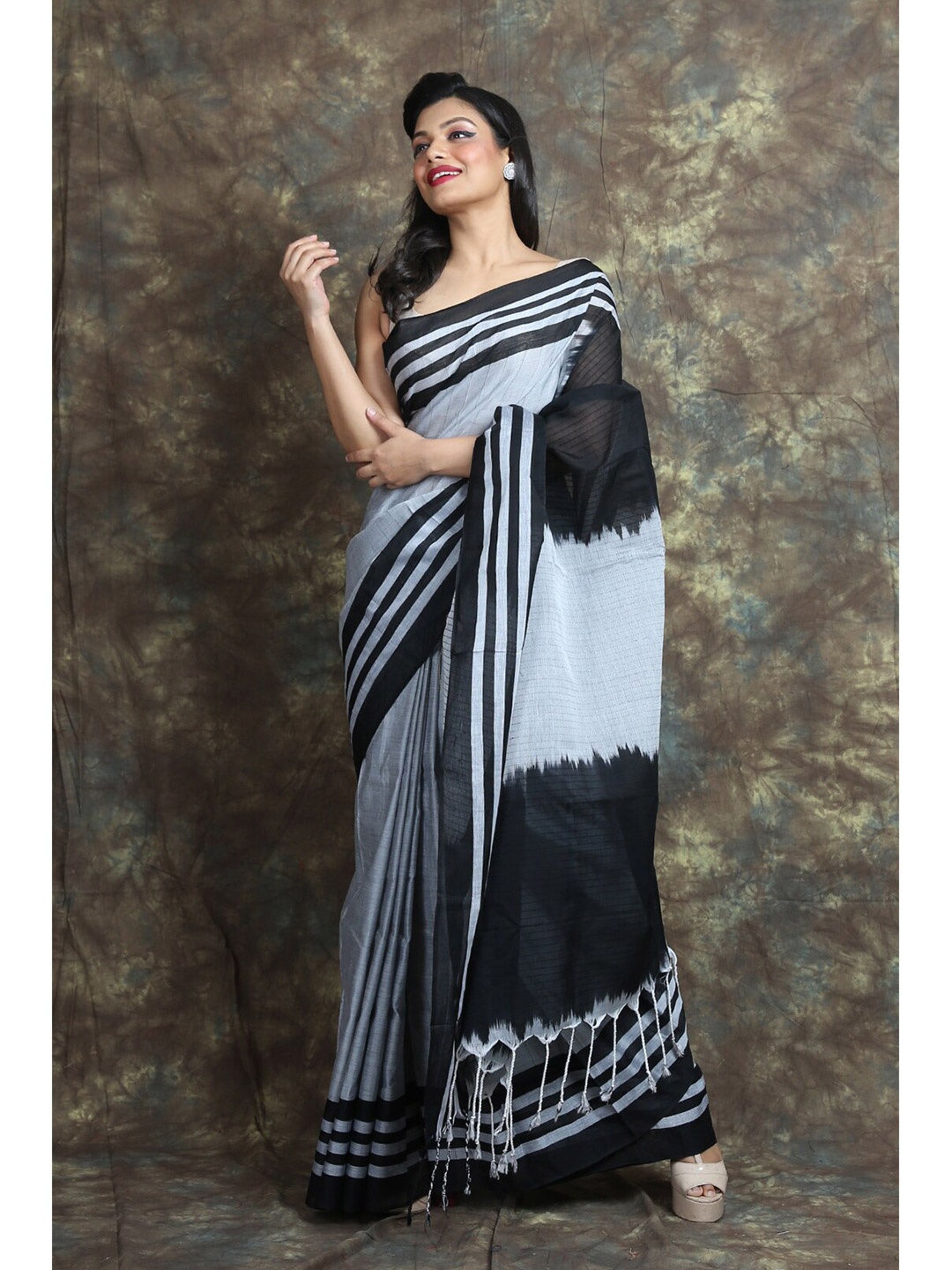 

Arhi Blue & Black Striped Saree
