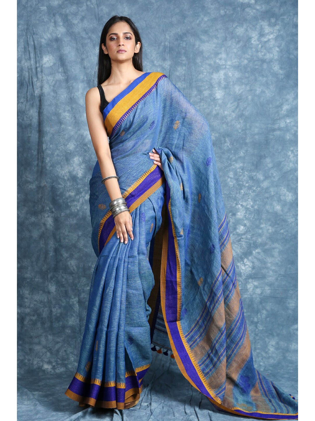 

Arhi Blue & Mustard Striped Pure Linen Saree