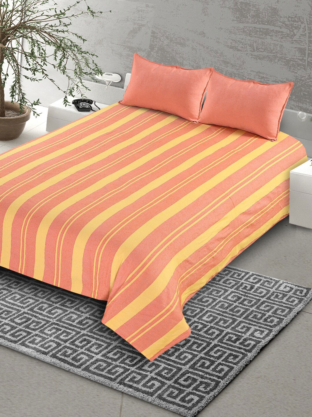 

Saral Home Orange & Yellow Striped 160 TC King Bedsheet with 2 Pillow Covers