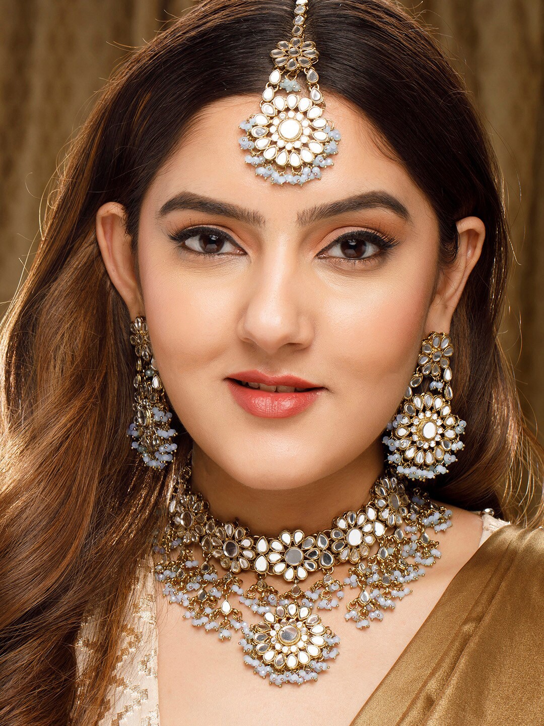 

Rubans Gold-Plated White Stone Studded Jewelry Set