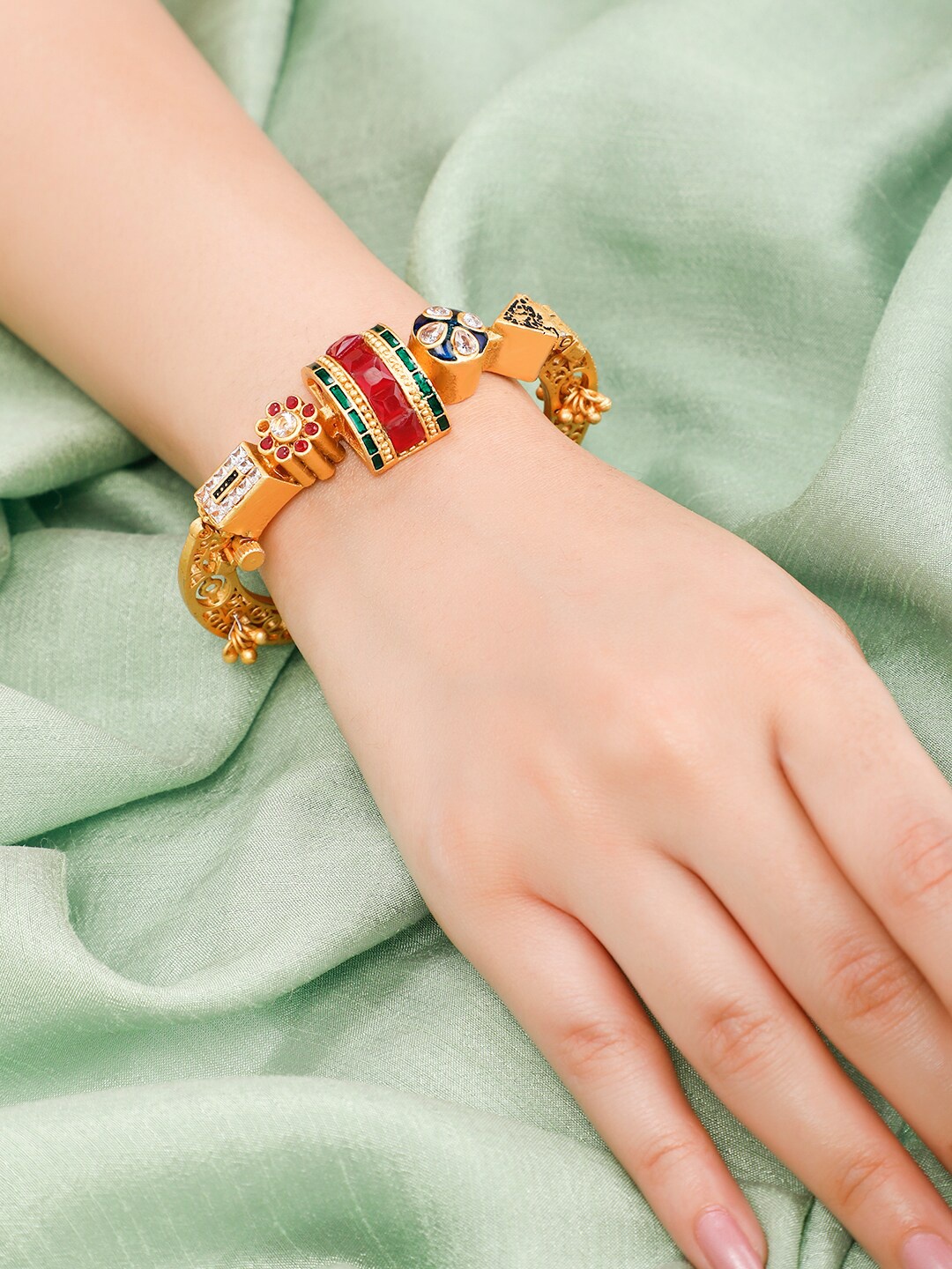 

Rubans Women Gold-Toned & Red Handcrafted Gold-Plated Bangle-Style Bracelet