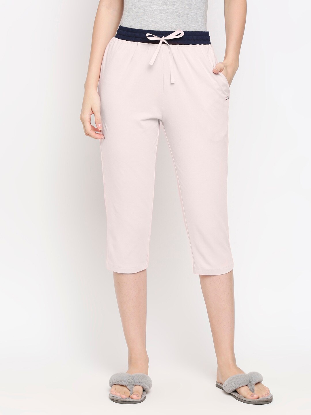 

XIN Women Peach-Coloured & Navy Blue Solid Capris