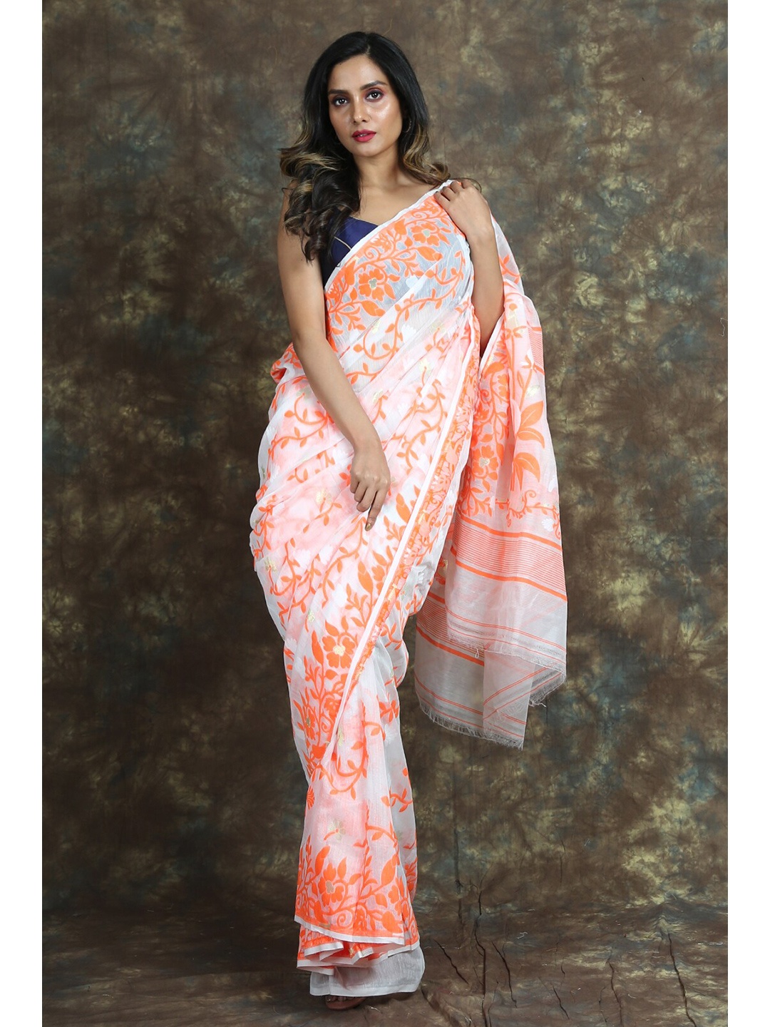 

Arhi White & Orange Floral Silk Cotton Jamdani Saree