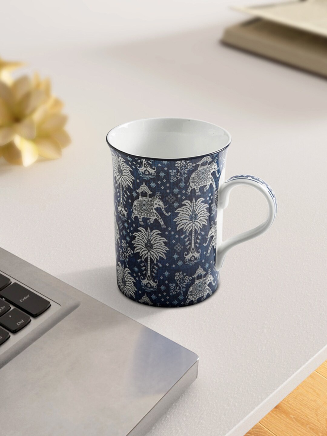 

Living scapes by Pantaloons Blue & White Floral Printed Ceramic Matte Mug