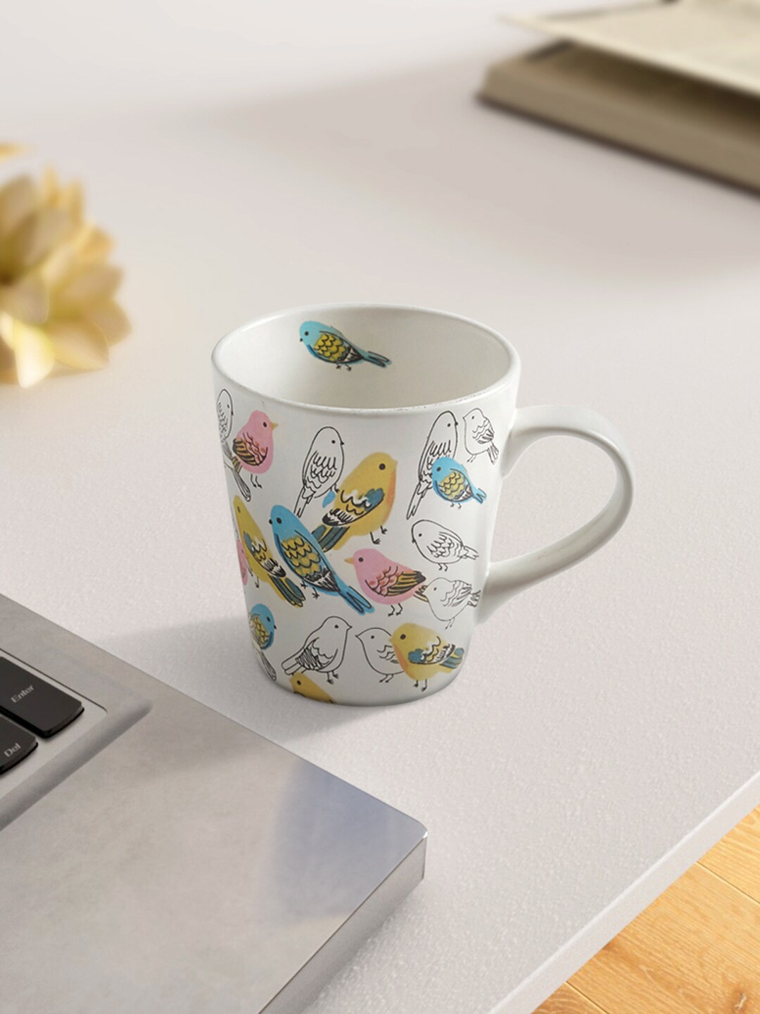 

Living scapes by Pantaloons Off White & Yellow Printed Ceramic Matte Mug