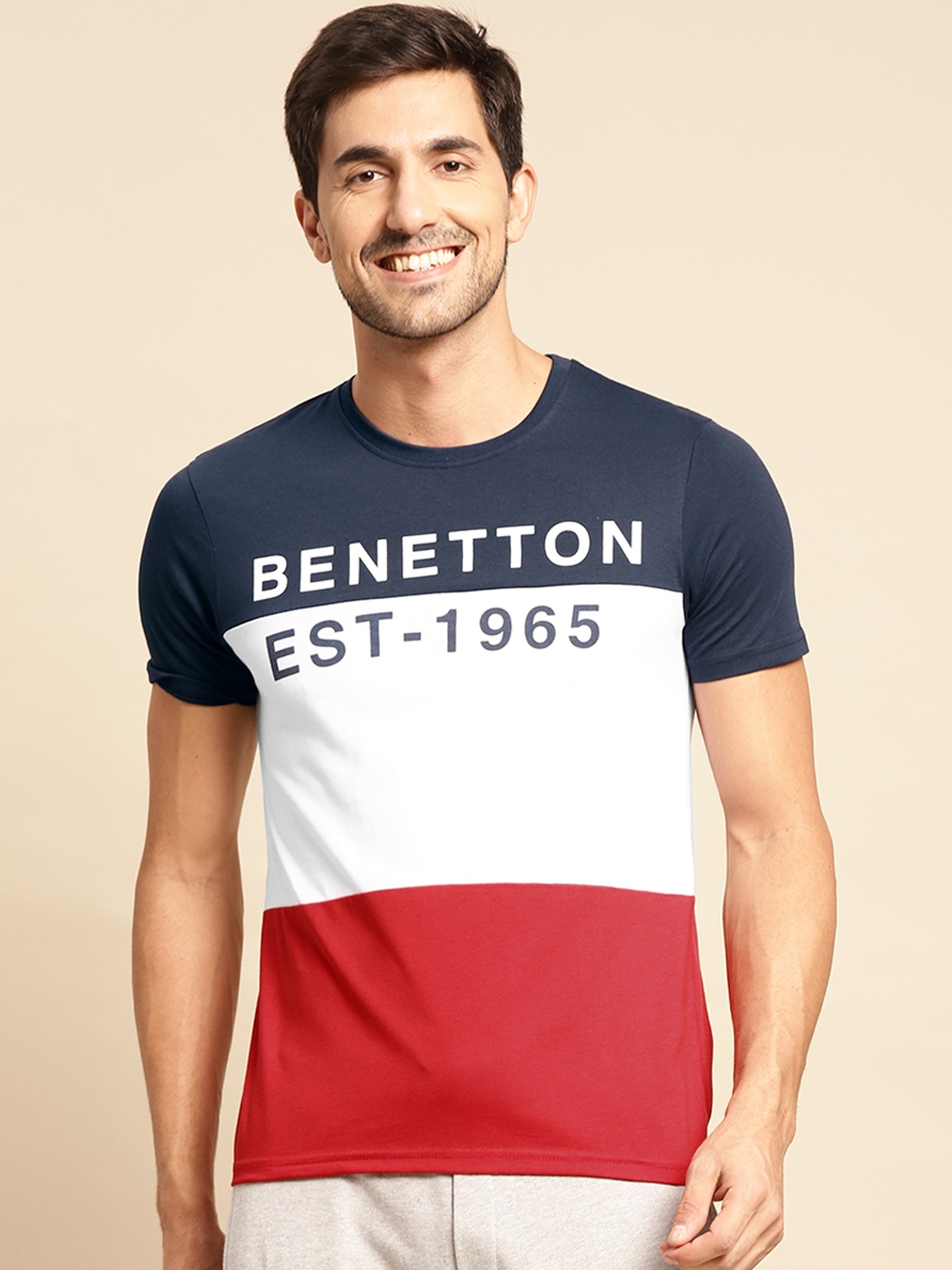 

United Colors of Benetton Men Navy Blue & White Brand Logo Colourblocked T-shirt