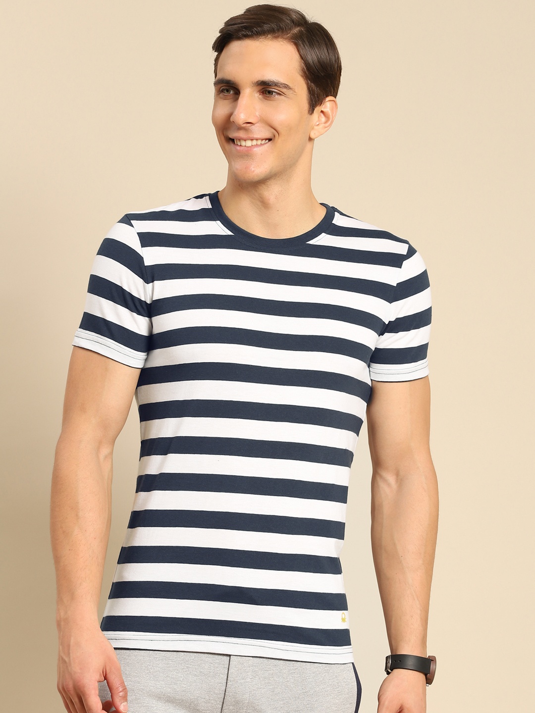 

United Colors of Benetton Men Navy Blue & White Striped T-shirt