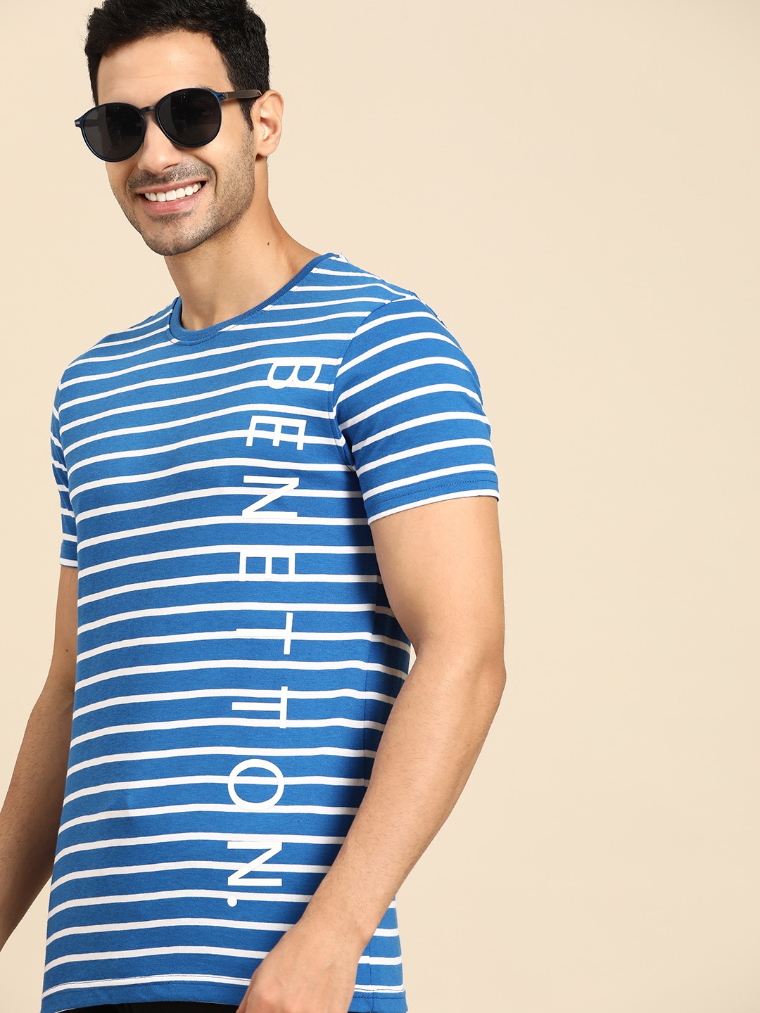 

United Colors of Benetton Men Blue & White Striped Brand Logo T-shirt