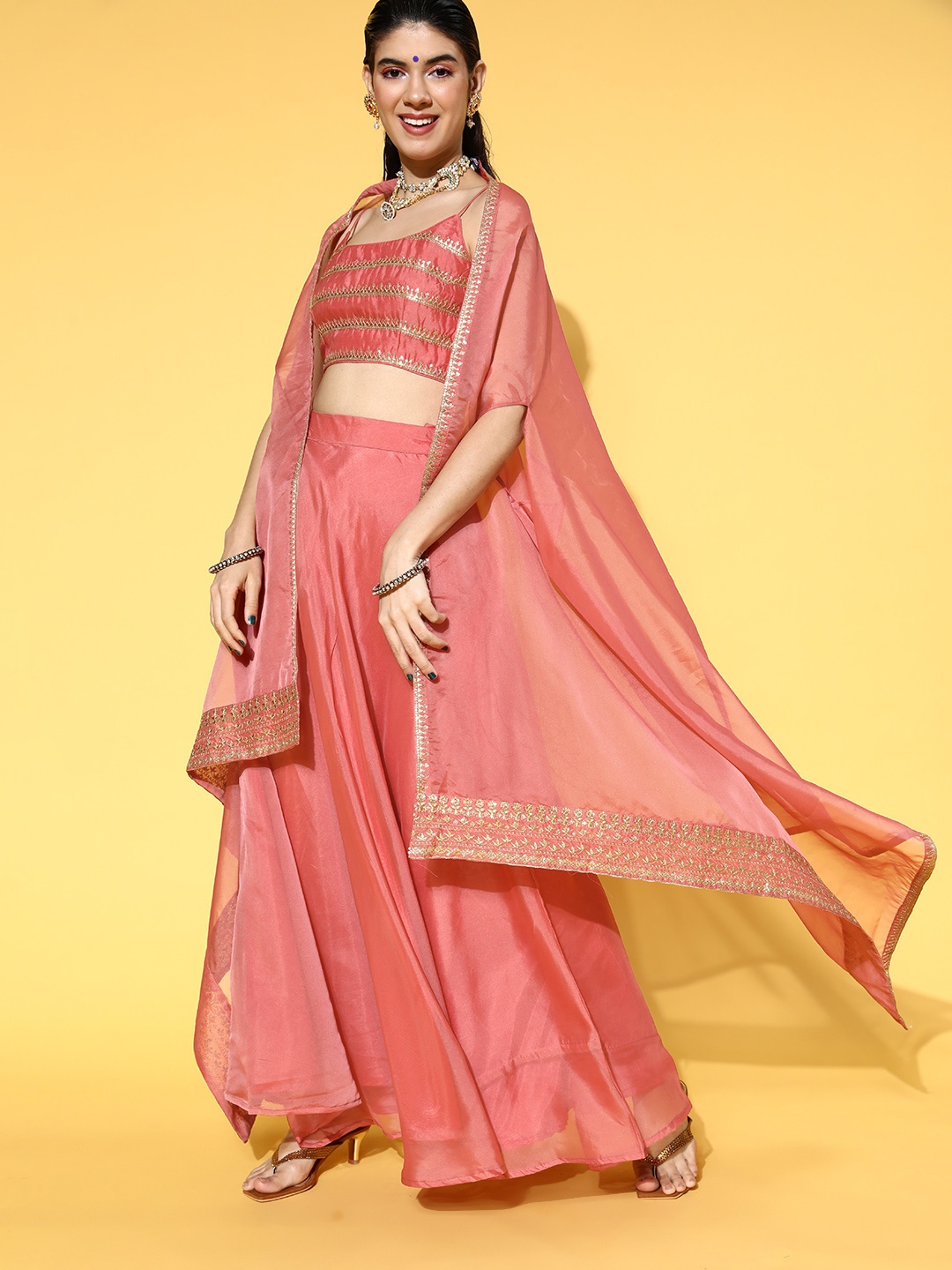 

Inddus Women Attractive Peach Embellished Top with Solid Skirt