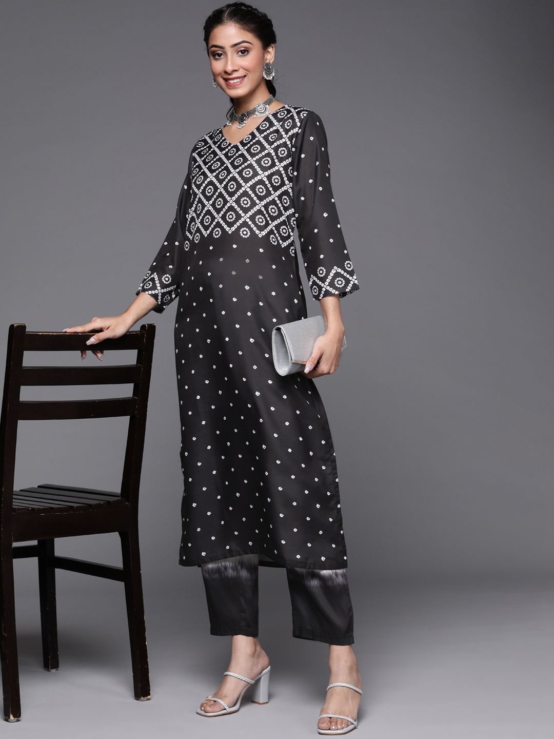 

Varanga Women Black Ethnic Motifs Printed Kurta with Trousers