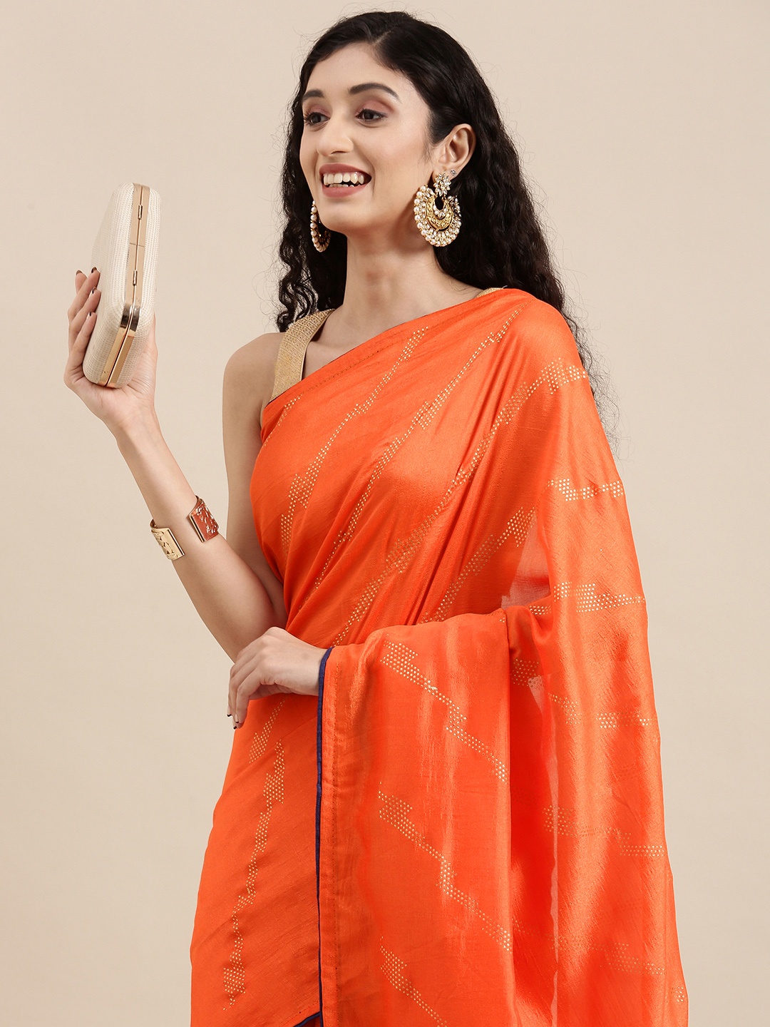 

Mitera Orange & Gold Embellished Gotta Patti Pure Chiffon Celebrity Saree