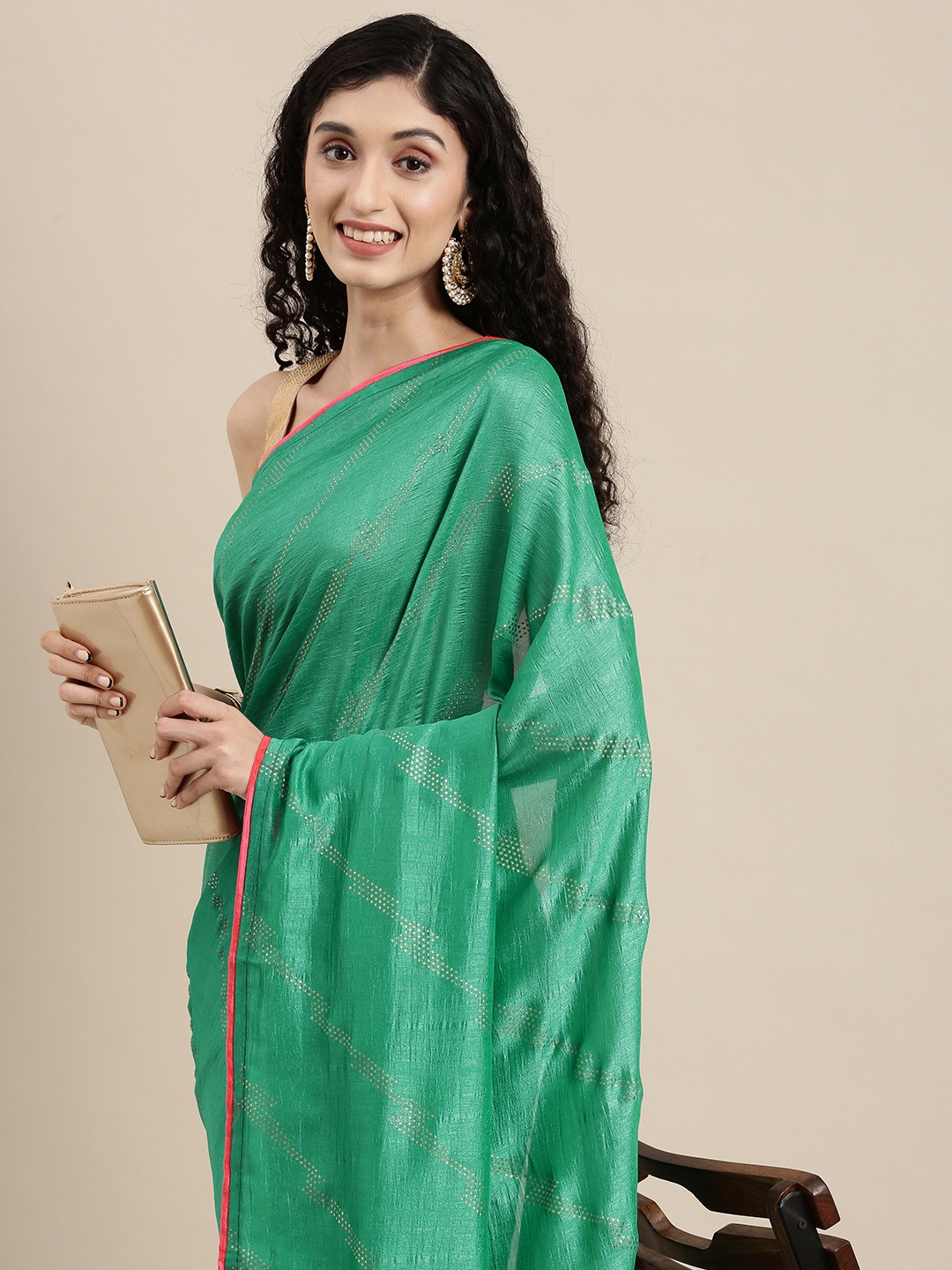 

Mitera Sea Green & Gold Striped Gotta Patti Pure Chiffon Celebrity Saree