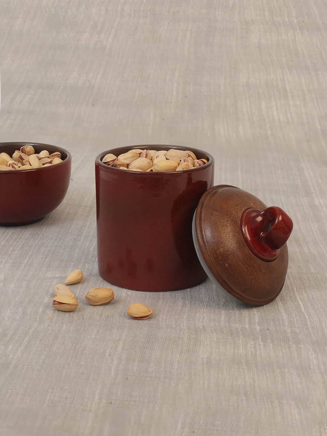 

ellementry Red Ceramic Storage Jar With Wooden Lid