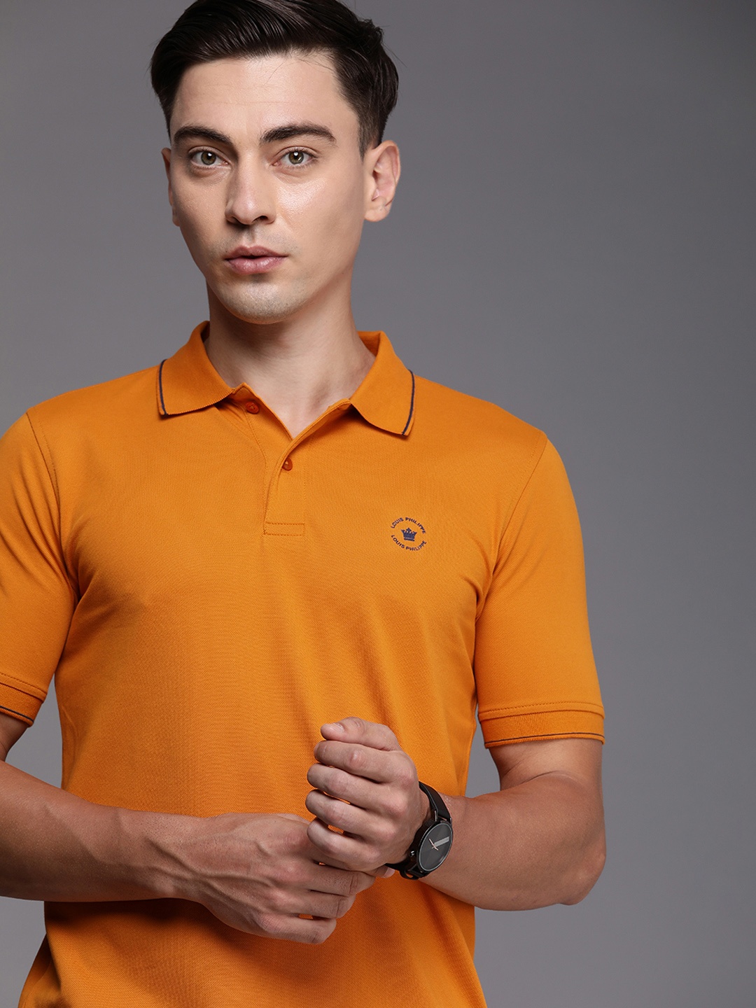 

Louis Philippe Men Orange Solid Polo Collar Casual T-shirt