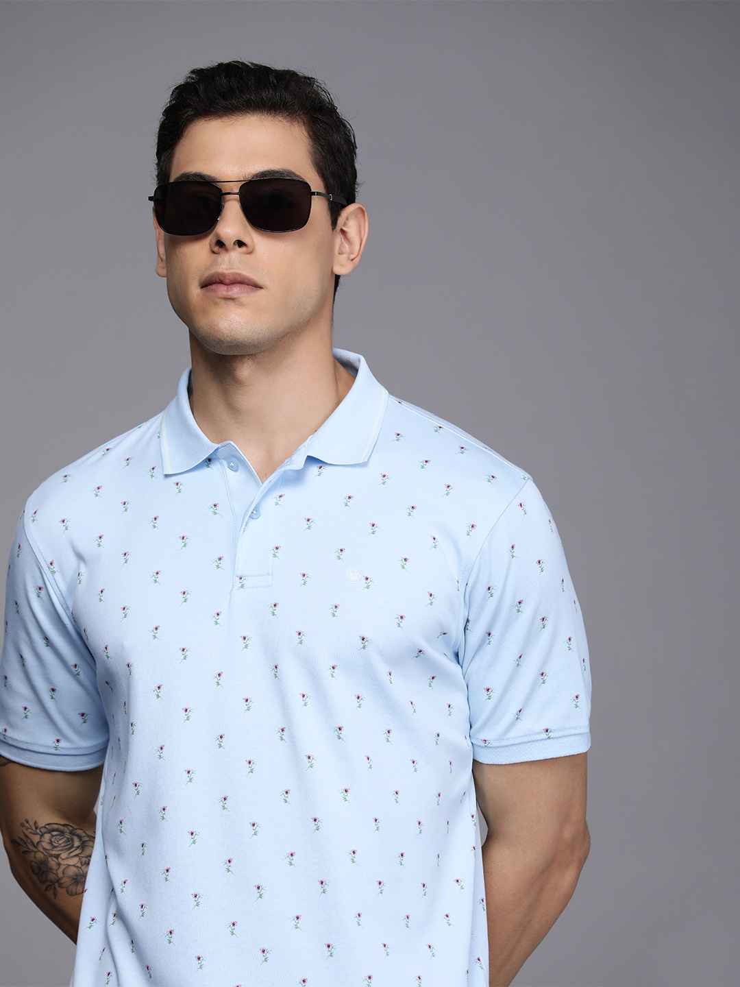 

Louis Philippe Men Blue Floral Printed Polo Collar Casual T-shirt