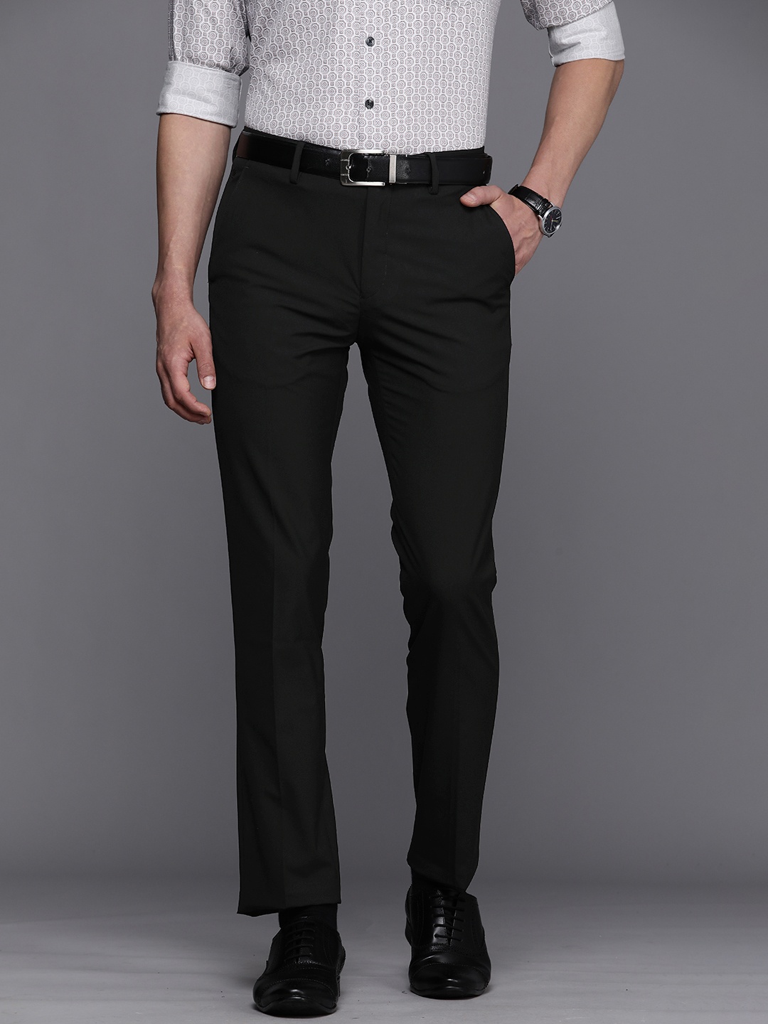 

Louis Philippe Men Black Solid Mid Rise Slim Fit Trousers