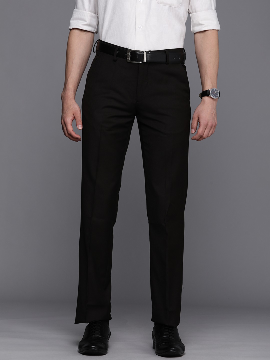 

Louis Philippe Men Brown Solid Mid Rise Formal Trousers