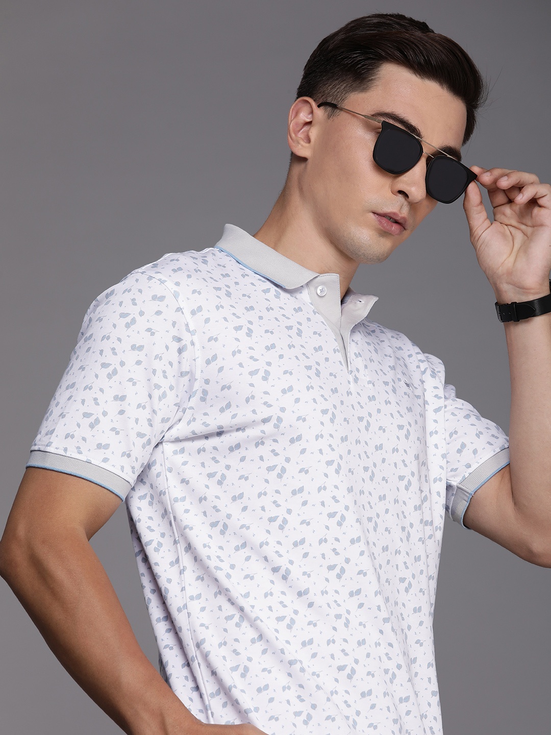 

Louis Philippe Men White & Grey Floral Printed Polo Collar Casual T-shirt
