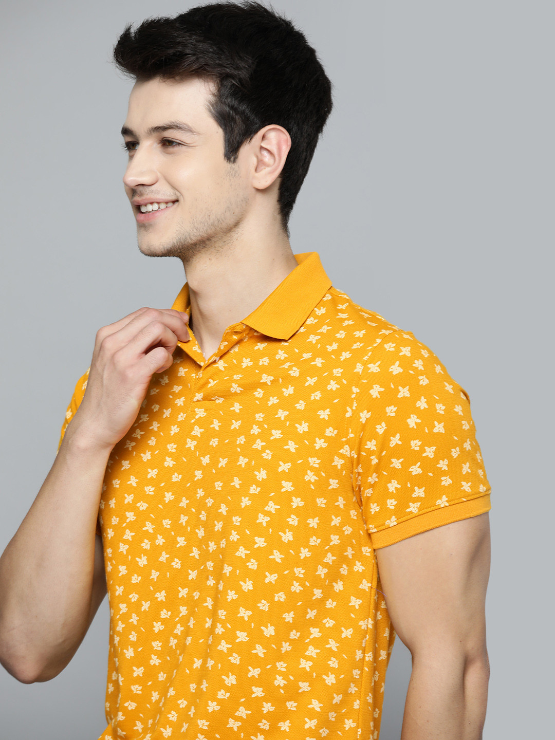 

Mast & Harbour Men Mustard Yellow & Off-White Abstract Printed Polo Collar T-shirt