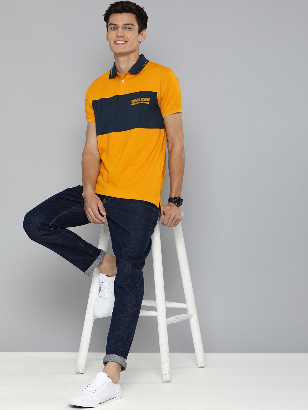 

Mast & Harbour Men Mustard Yellow & Navy Blue Colourblocked Polo Collar T-shirt