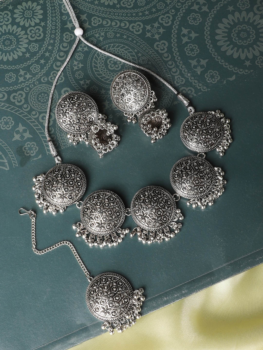 

ANIKAS CREATION Oxidized Silver Round Coins Choker Necklace With Earrings & Maang tikka