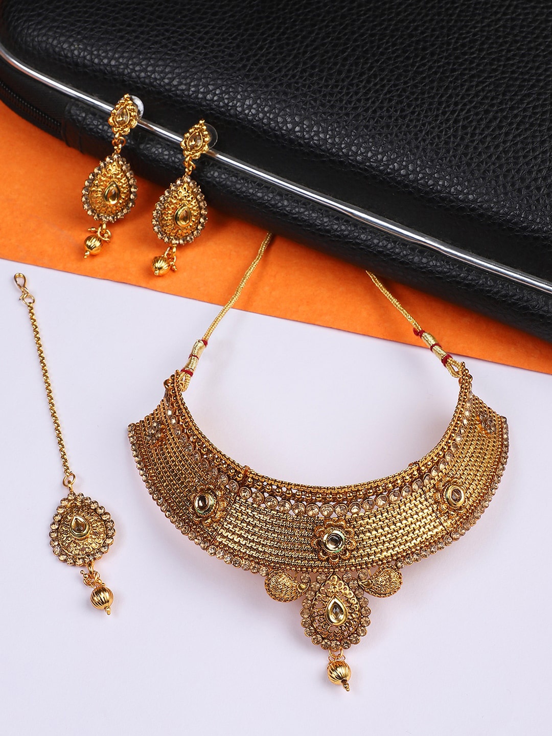 

ANIKAS CREATION Gold-Plated Stone-Studded Traditional Hasli Style Jewellery Set