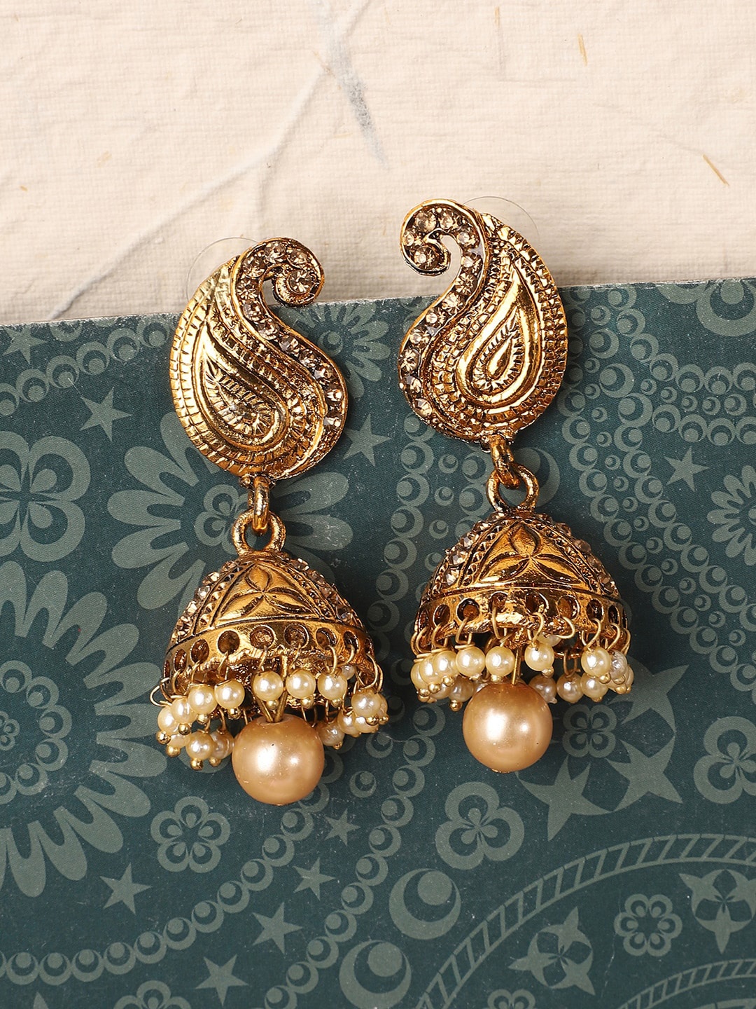 

ANIKAS CREATION Gold Plated Stone and Pearl Studded Jhumkas Earrings