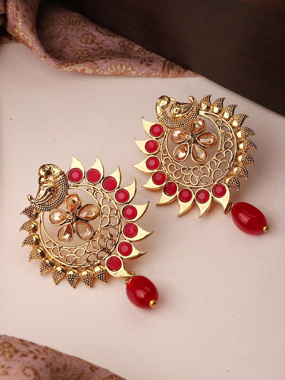 

ANIKAS CREATION Red & Gold-Toned Contemporary Studs Earrings