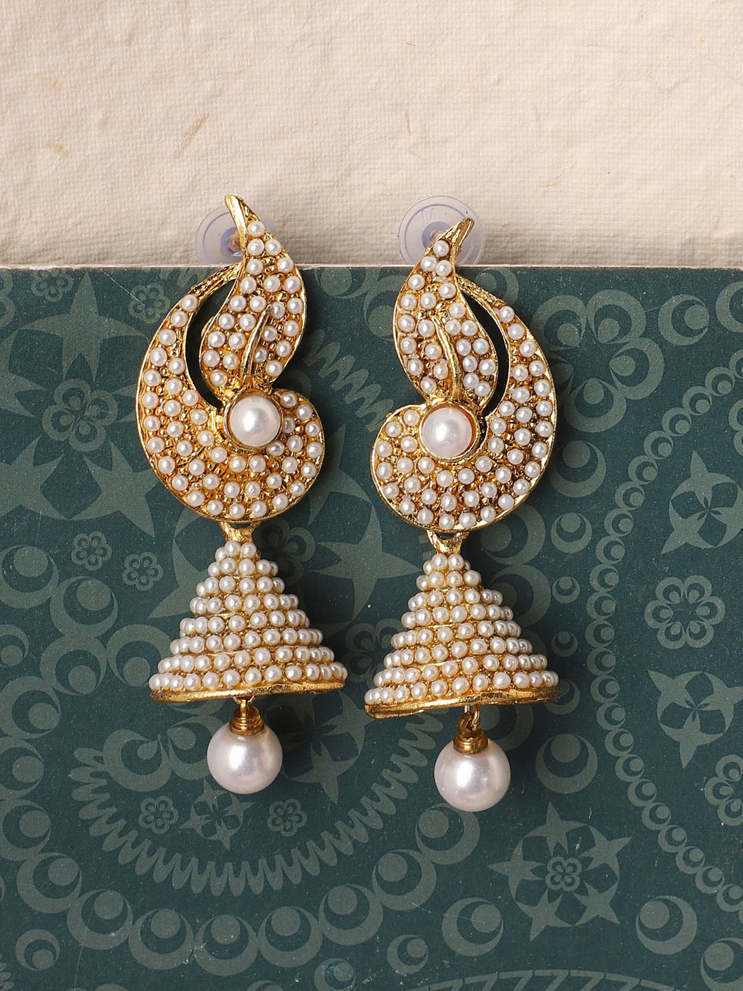 

ANIKAS CREATION Gold Plated & White Pearl Studded Jhumkas Earrings
