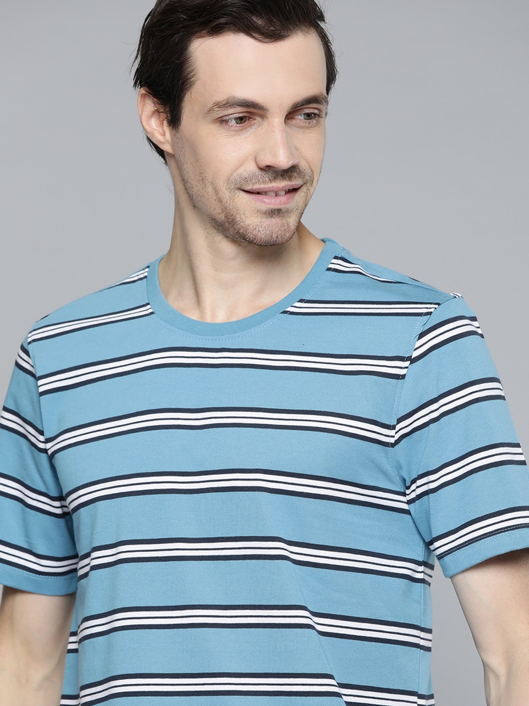 

Mast & Harbour Men Blue & White Striped T-shirt