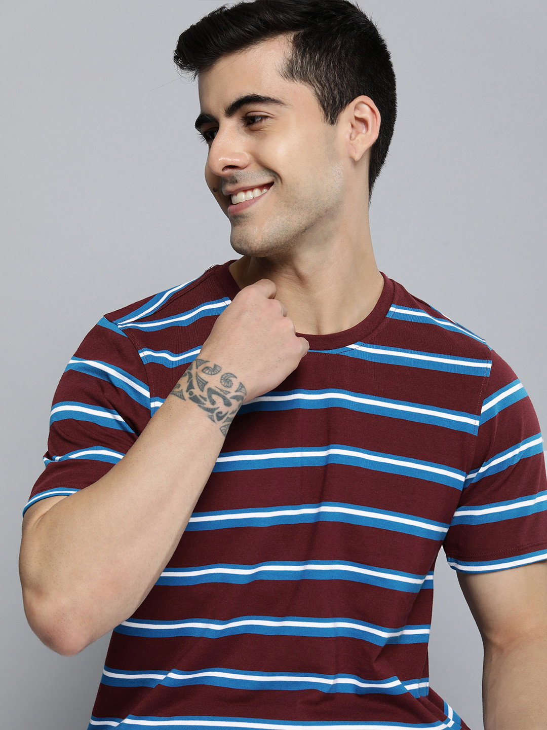 

Mast & Harbour Men Burgundy & Blue Striped T-shirt
