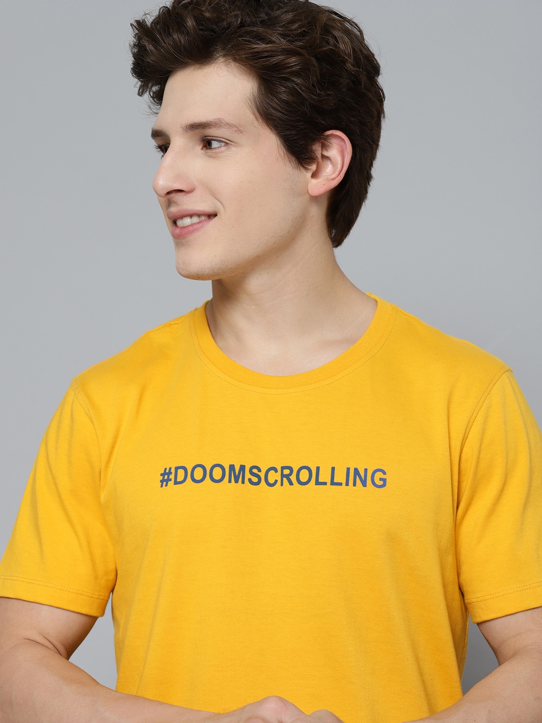 

Mast & Harbour Men Yellow & Blue Typography T-shirt