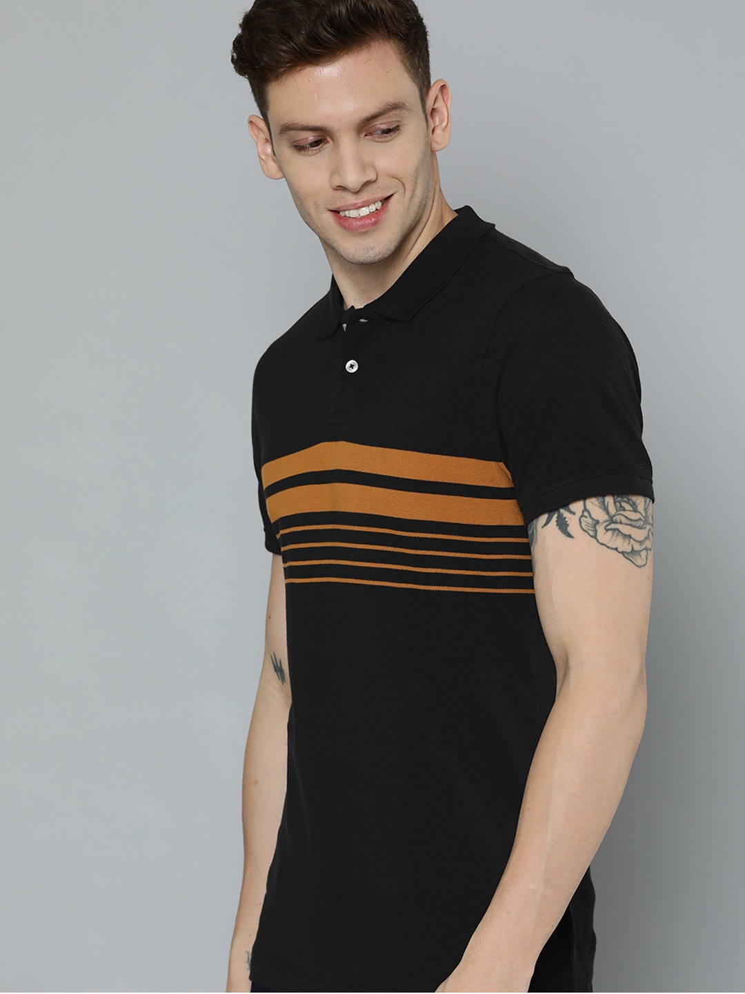 

Mast & Harbour Men Black & Mustard Yellow Striped Polo Collar Pure Cotton T-shirt