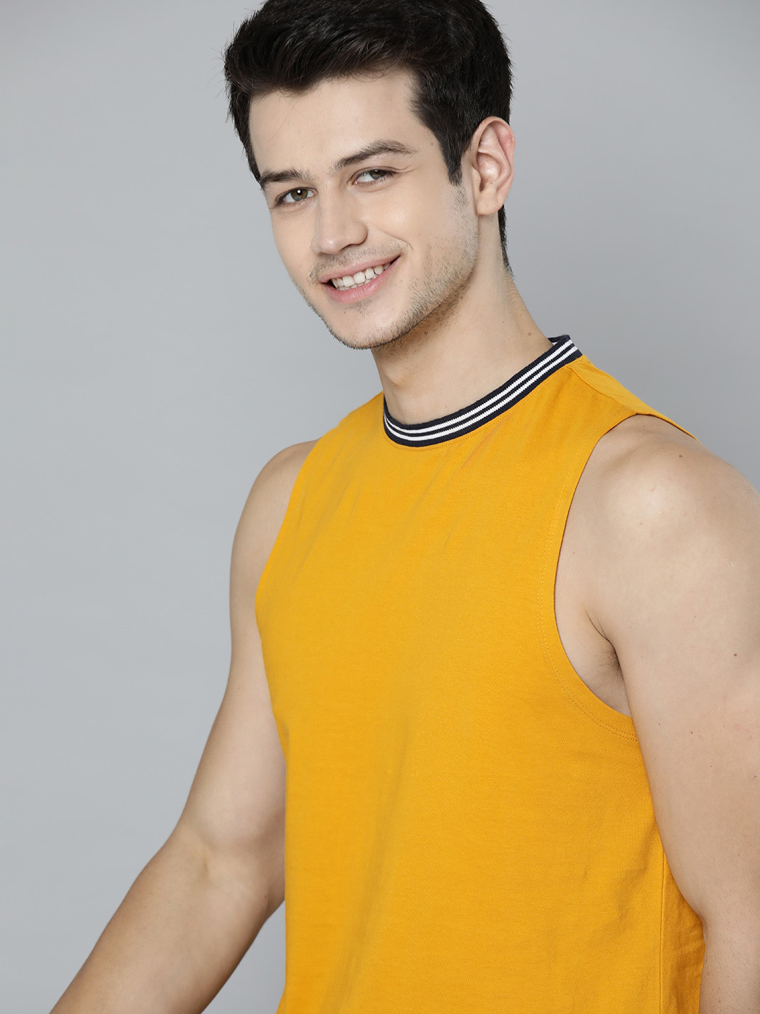 

Mast & Harbour Men Mustard Yellow Solid Pure Cotton T-shirt