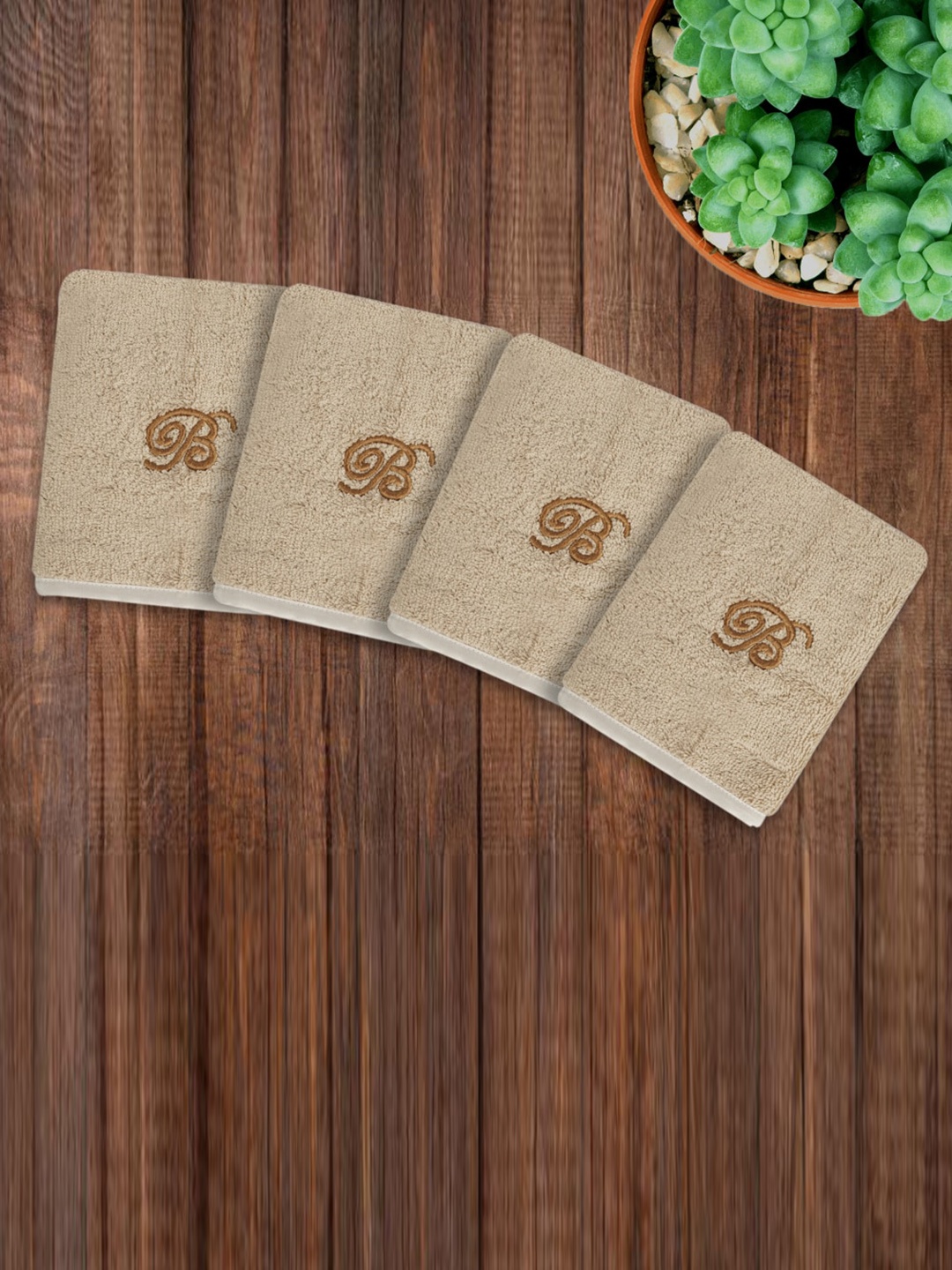 

LUSH & BEYOND Set Of 4 Beige Solid 500 GSM Pure Cotton Face Towels With Initial B