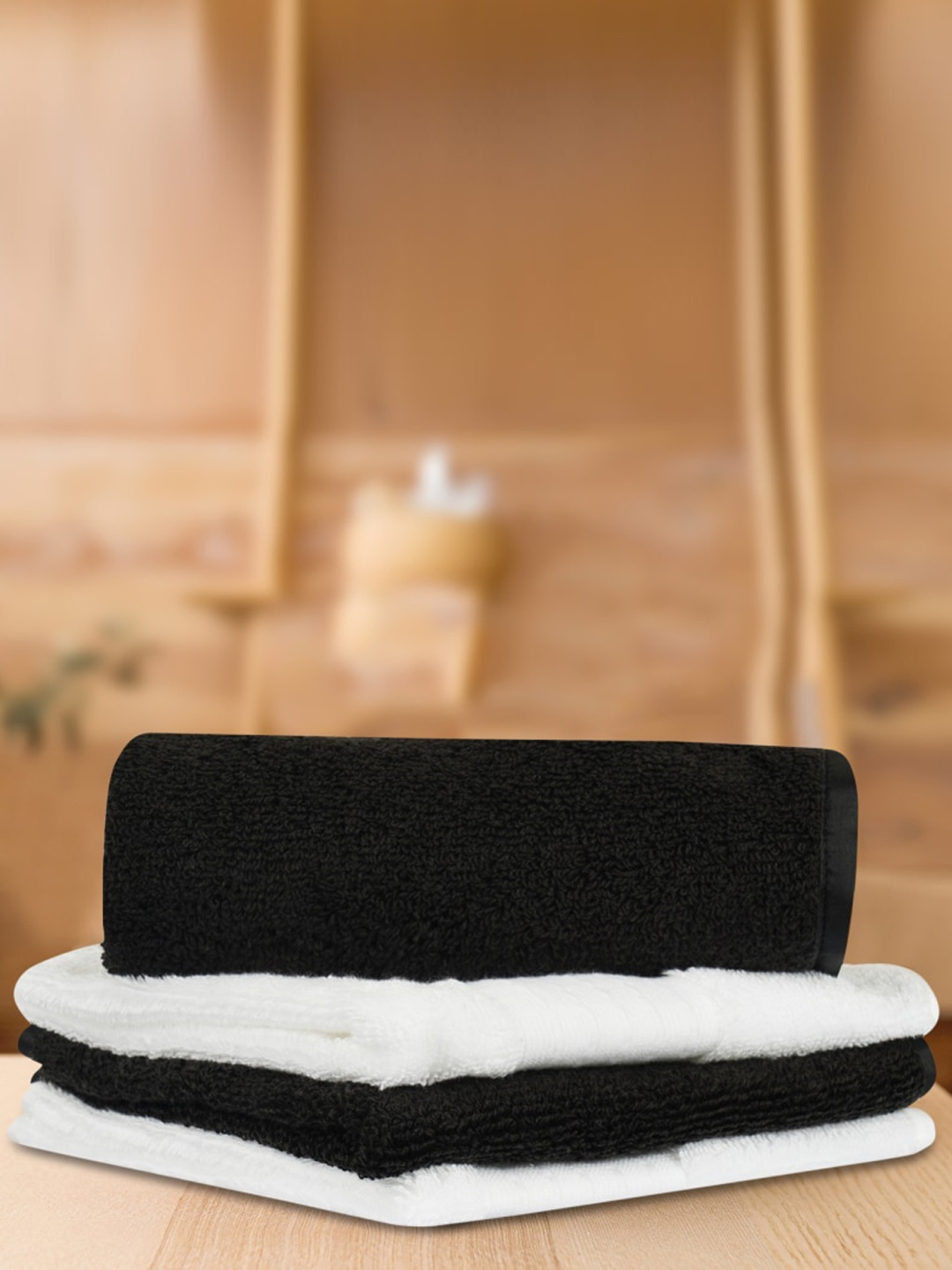 

LUSH & BEYOND Set Of 4 White & Black Solid 500 GSM Pure Cotton Face Towels