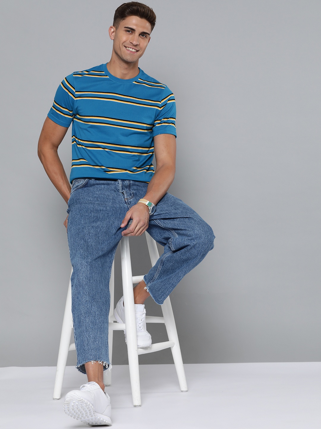 

Mast & Harbour Men Blue & Black Striped T-shirt